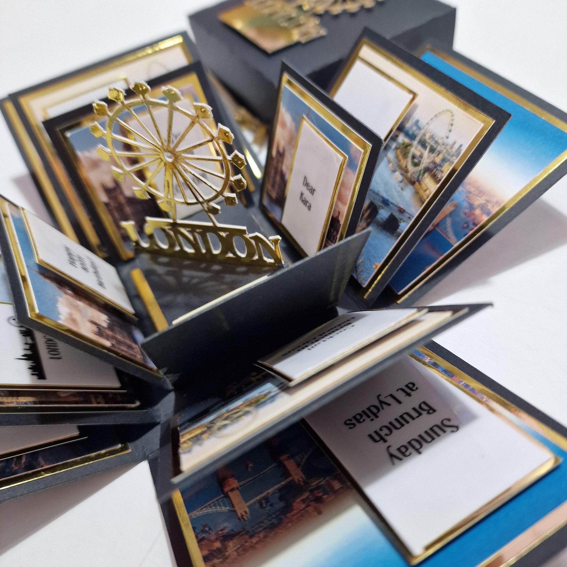 Exploding Occasions Box - Trip Reveal LONDON, showcasing a detailed London-themed design with paper panels and a freestanding London Eye, perfect for announcing a surprise trip.