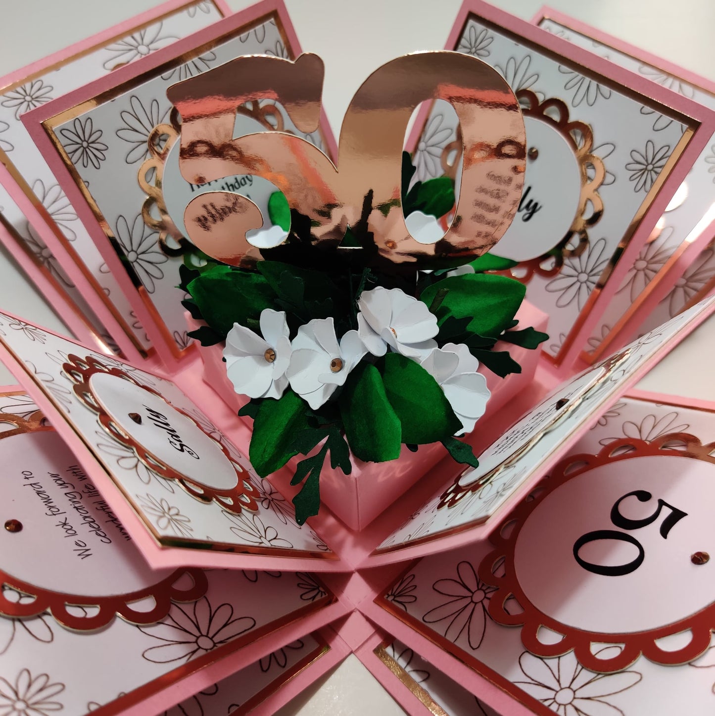 Doodled Daisies Birthday Celebration Pop-Open Box Card featuring a 3D bouquet of white flowers with green foliage and a freestanding age, personalized with elegant floral and rose gold accents.