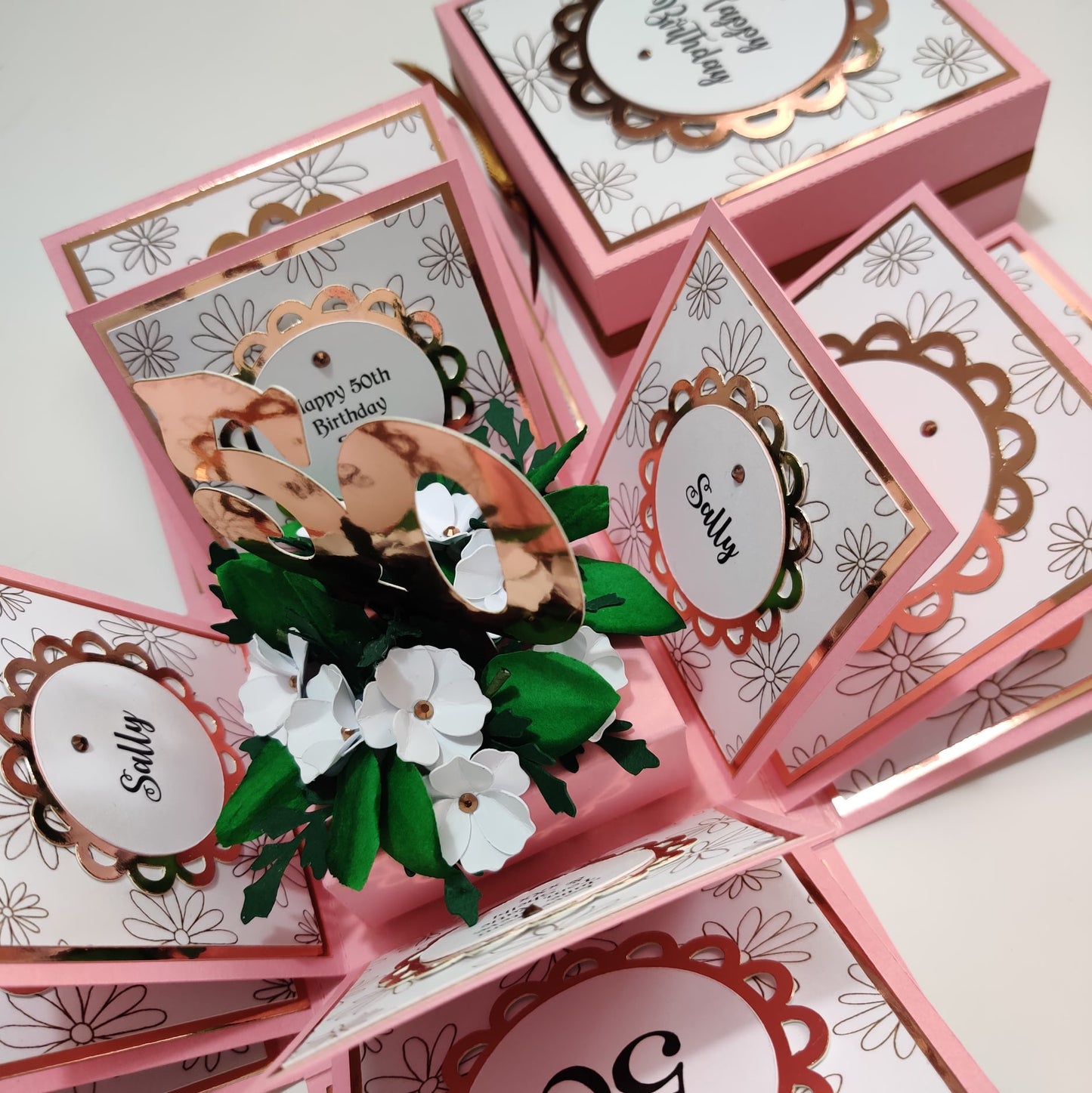 Doodled Daisies Birthday Celebration Pop-Open Box Card featuring pink floral patterns, rose gold accents, and a 3D bouquet, perfect for personalized birthday celebrations.