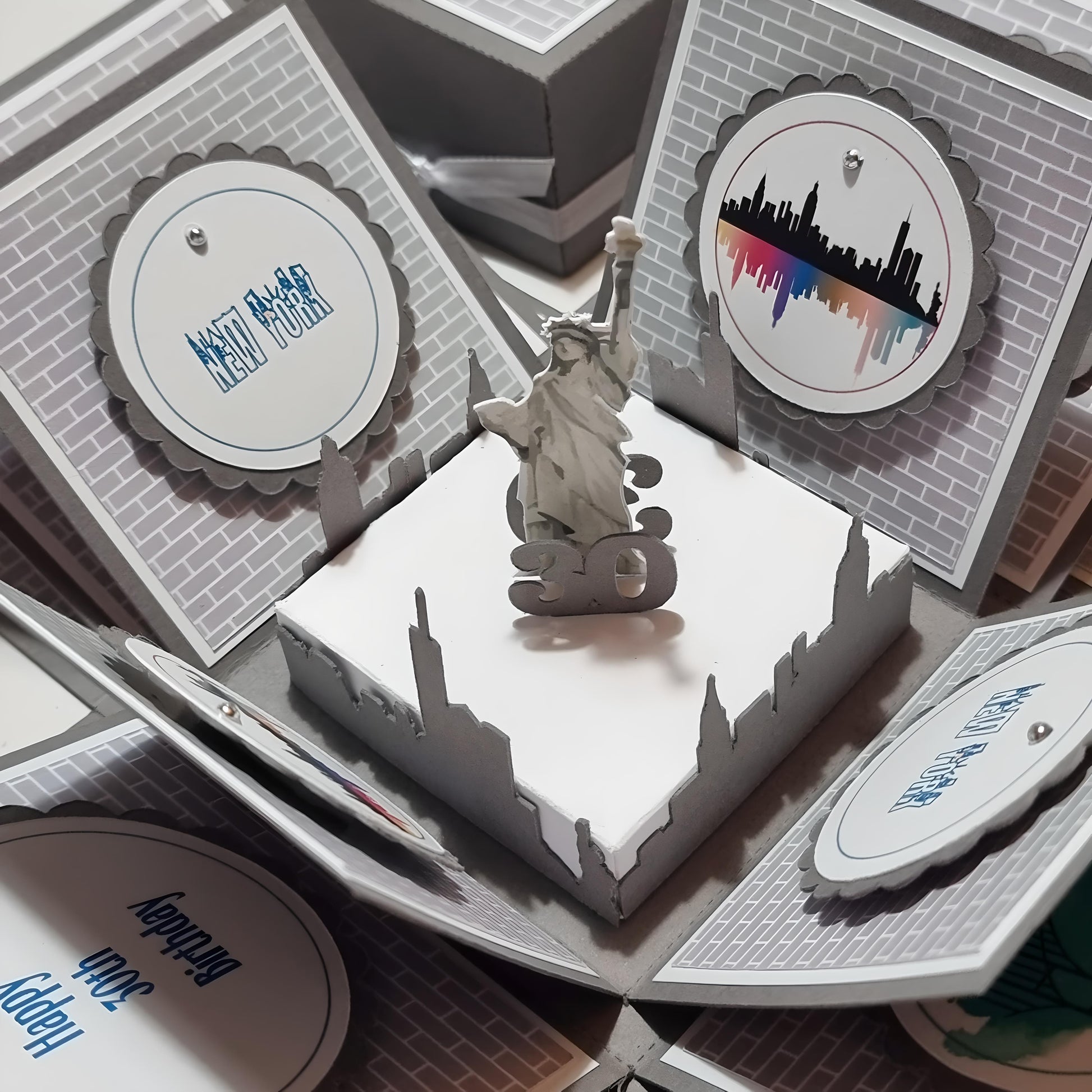 New York - Silver Grey Graffiti Styled - Surprise Special Occasion | Celebration Trip Reveal Explosion Box features a Statue of Liberty on top, complemented by New York-themed panels and intricate design.